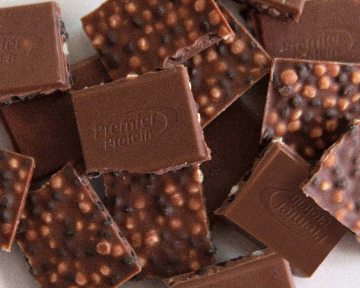 Chocolate bars with Premier Protein logo on a white background