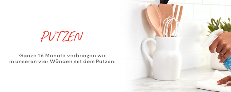White mug with kitchen utensils on a white surface, with text 'PUTZEN' and German text below.